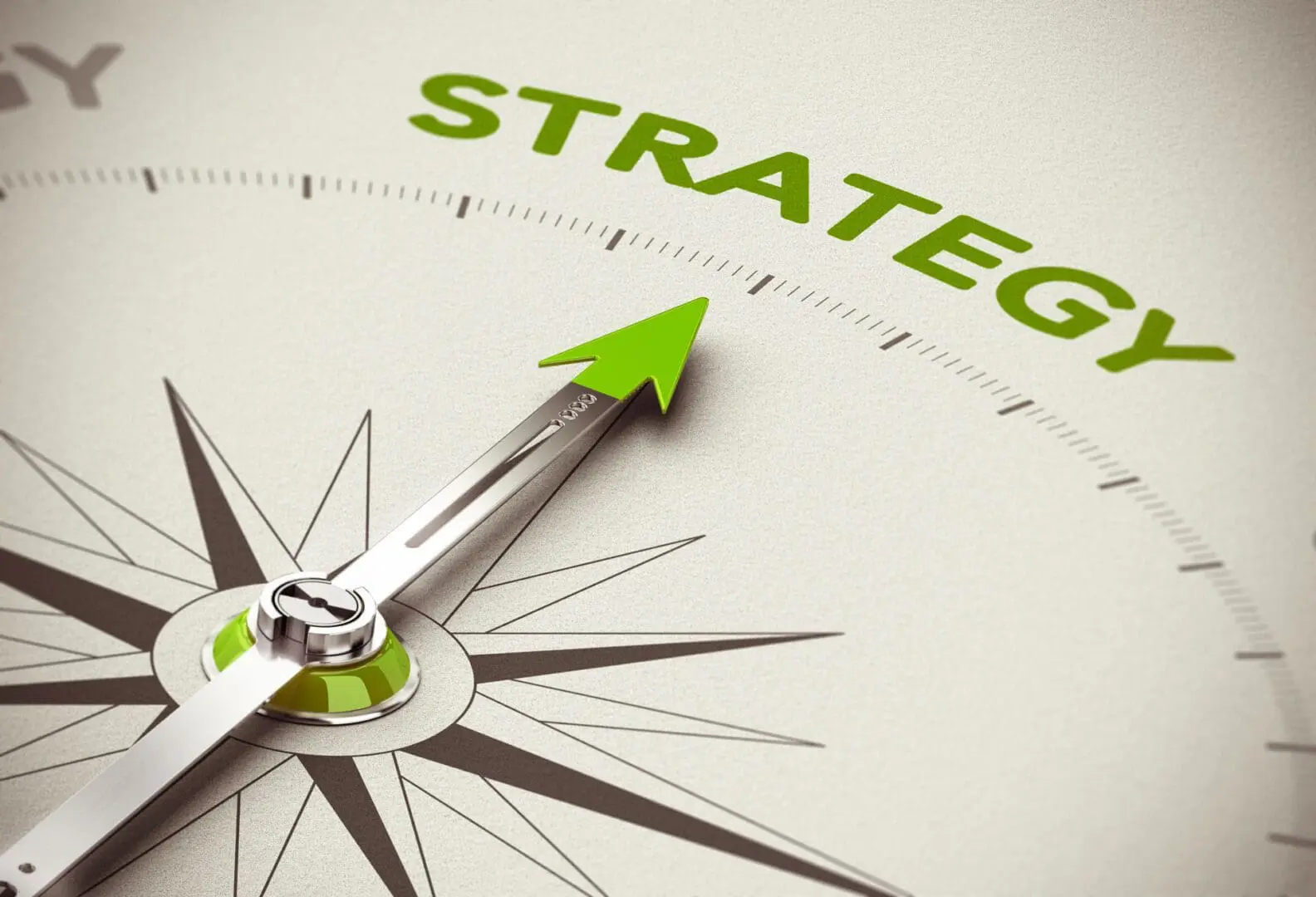 A compass with the word strategy written on it.